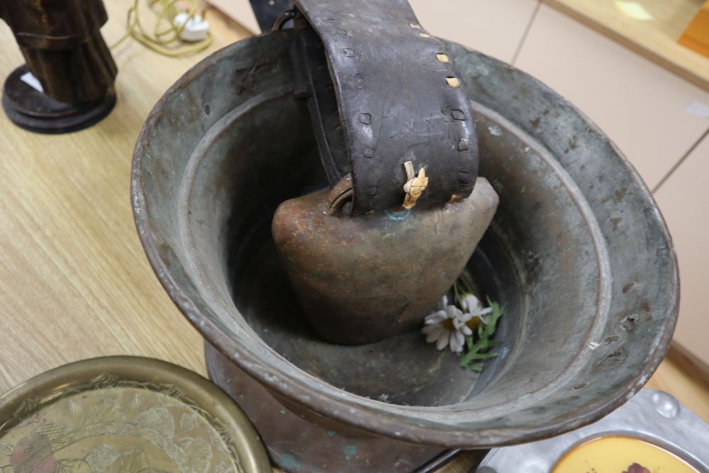 Two cow bells, one dated 1886, a sheet-iron milk skimmer, an iron toaster, etc. (10)